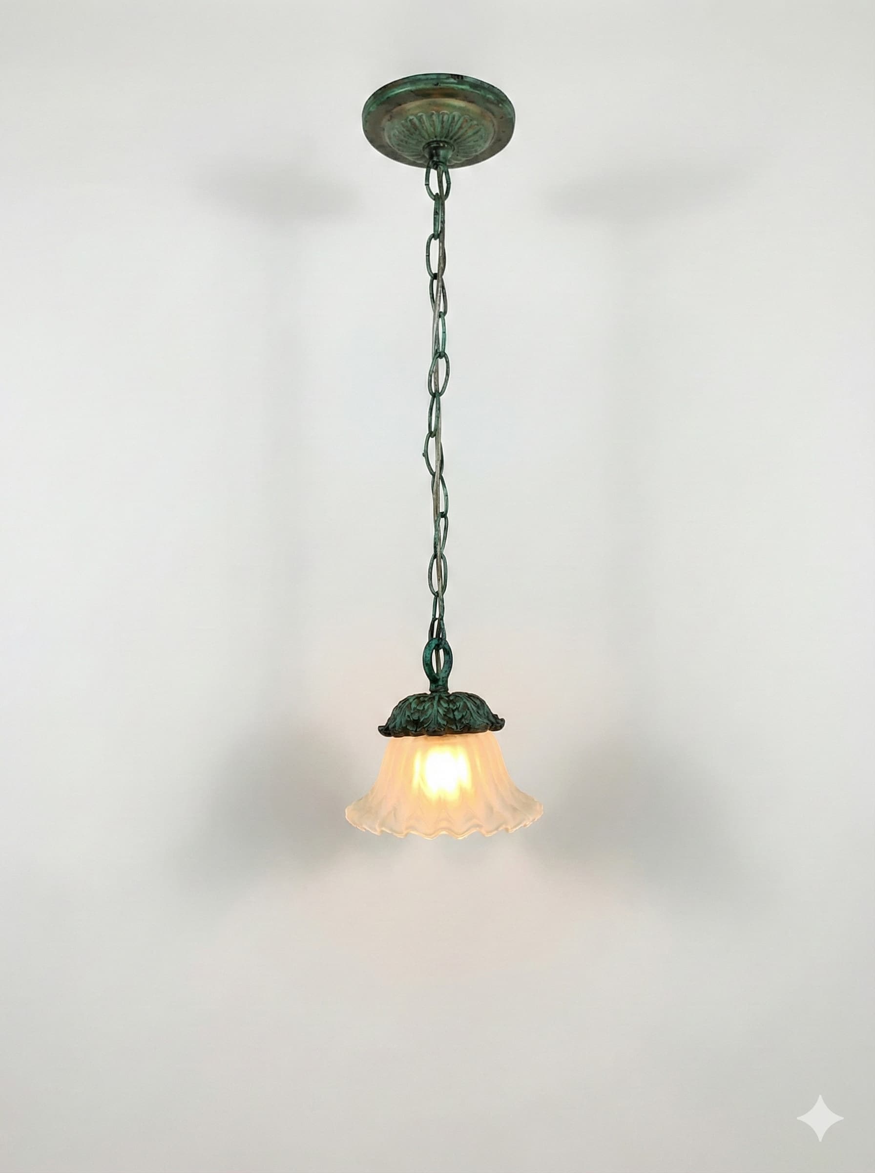 The Revival pendant light lit